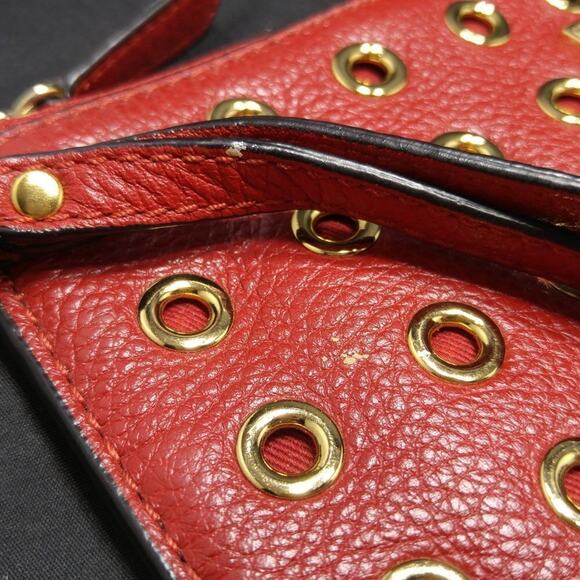 Michael Kors Red Leather Grommet Studded Wristlet Clutch, 10 Inch by 5 1/2 Inch - Picture 4 of 8